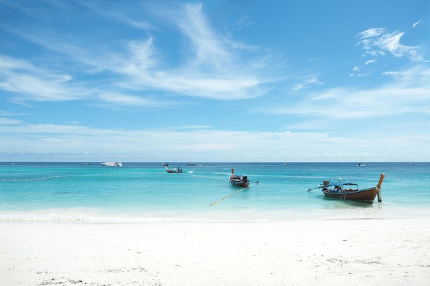 The longtail boat or Boat in Koh Lipe Beautiful tropical landscape Beach at Thailand