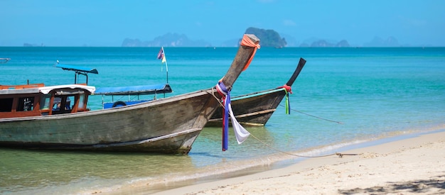 Longtail boat on Tubkaak beach ready to Hong island Krabi Thailand landmark destination Southeast Asia Travel vacation and holiday concept