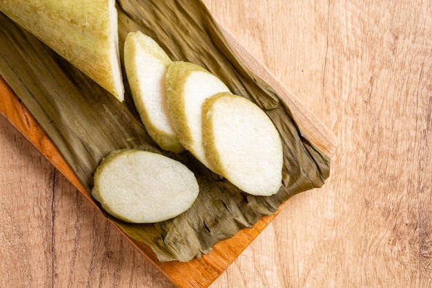 Lontong is an Indonesian dish Rice is rolled inside a banana leaf and boiled