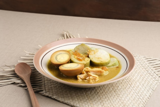 Lontong Opor Indonesian traditional breakfast or a Eid menu Selected focus