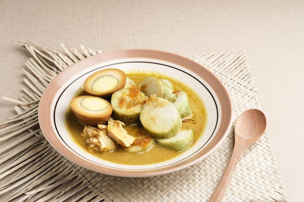 Lontong Opor Indonesian traditional breakfast or a Eid menu Selected focus