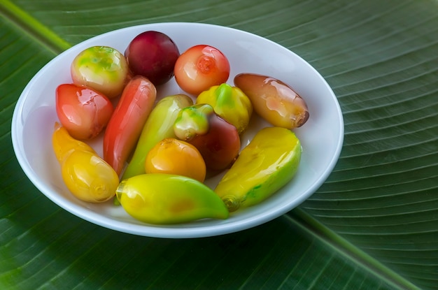 Photo look choop, also spelled look choop, is a thai dessert that comes from a portuguese marzipan recipe called massapao.