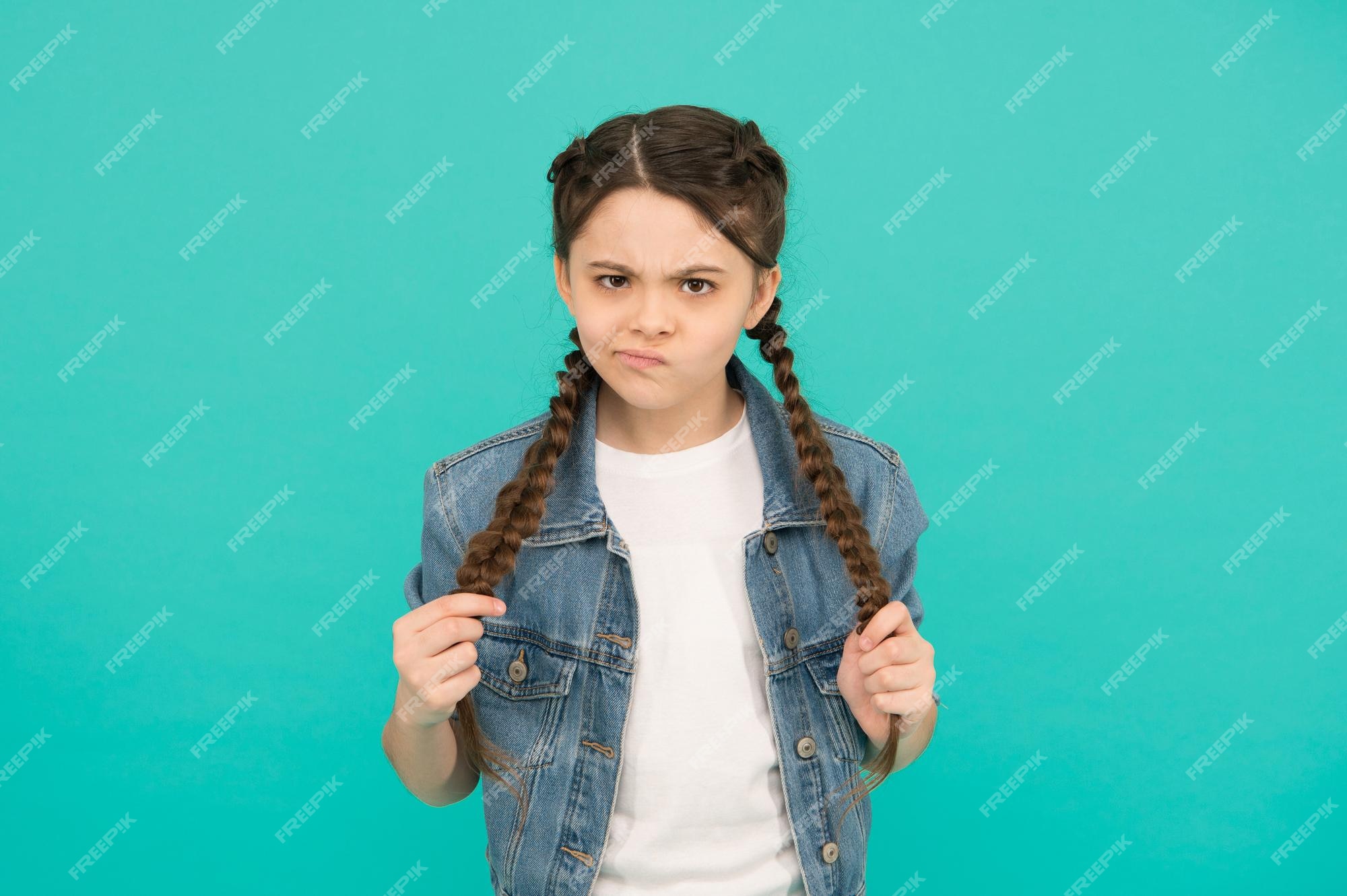 Premium Photo | Look of discontent unhappy girl with braided hairstyle  beauty look of little child casual fashion look trendy style childrens clothing  hair salon update your look