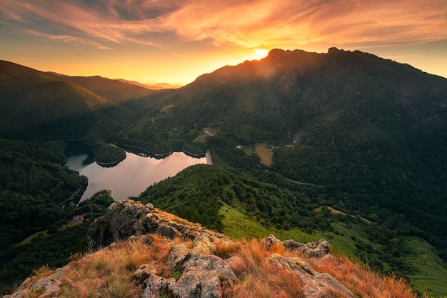 Look at Endara dam and the Aiako Harriak three peaks at the natural park on the Basque Country.