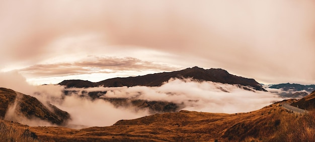 looking down to the cloud covered valley below crown range