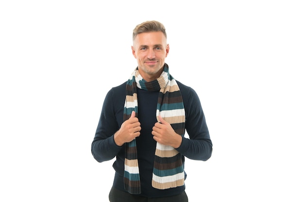 Looking elegant. handsome smiling mature guy. male fashion for cold season. say no to flu. man in warm knitting isolated on white. happy unshaven man in winter scarf. feel cozy and comfortable.