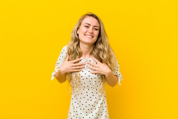 looking happy, surprised, proud and excited, pointing to self