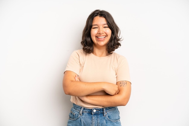 Looking like a happy proud and satisfied achiever smiling with arms crossed