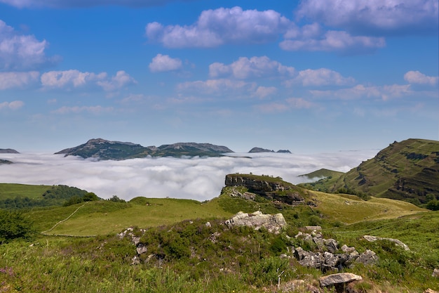 Looking over a sea of clouds in the mountains, on a clear day