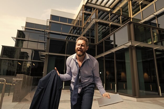 Looking shocked and emotional furious stressed businessman after project failure