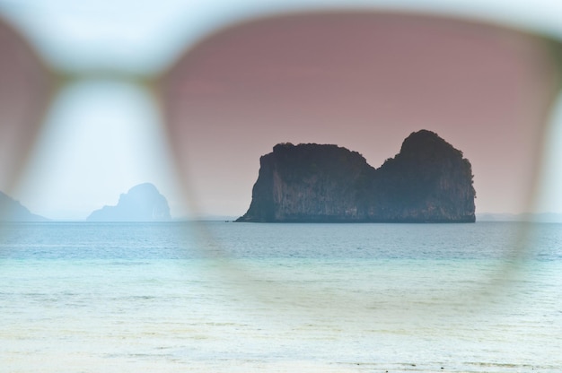 Looking through pink sun glasses Phuket Sea Thailand