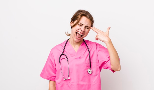 Looking unhappy and stressed suicide gesture making gun sign