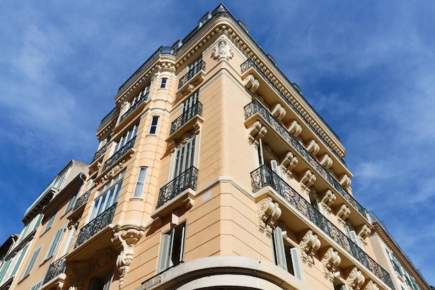 Looking up at the architectural details of an old apartment building in Toulon France