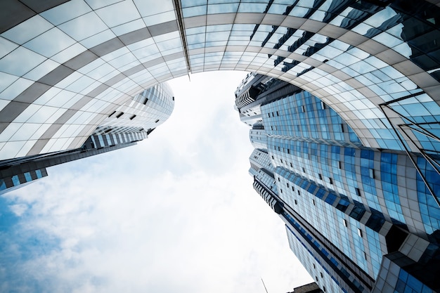 Looking Up Blue Modern Office Building