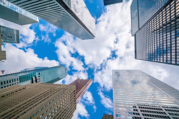 Photo looking up shot of downtown financial district with skyscrapers in  toronto canada.