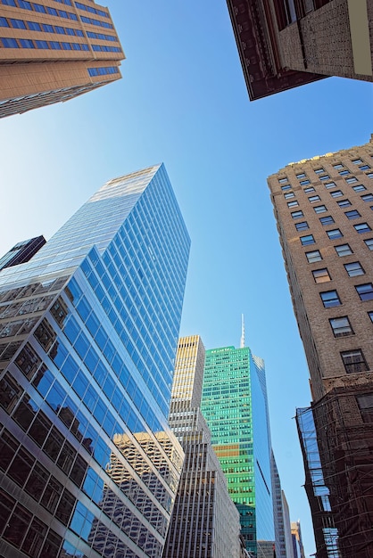 Looking up at skyscrapers in Lower Manhattan, New York City, USA