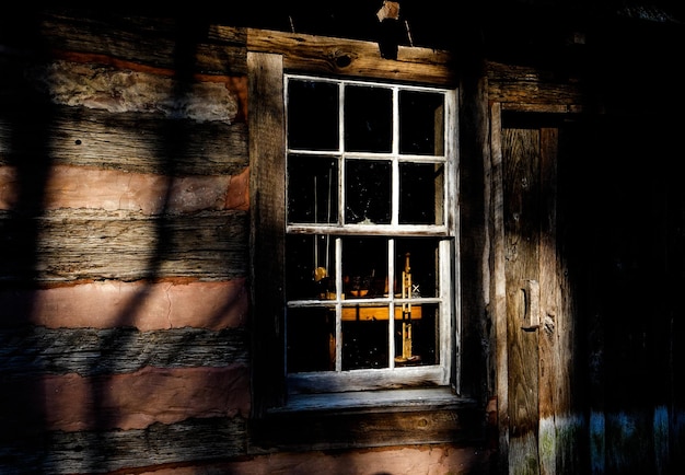 Looking in at the wooden cottage