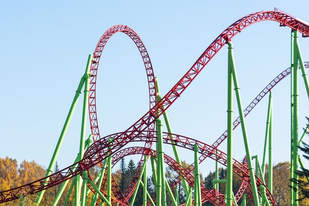 Loop and turn on a roller coaster in an amusement park.