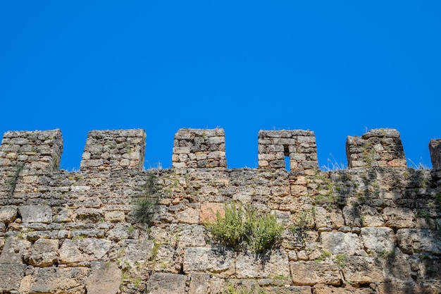 Loopholes of the limestone wall the fortress wall of the ancient fortress