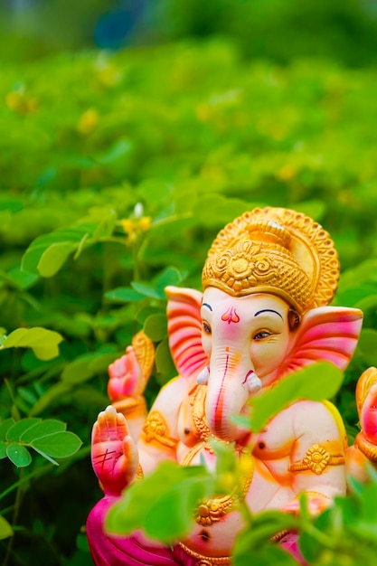 Lord ganesha sculpture on nature background