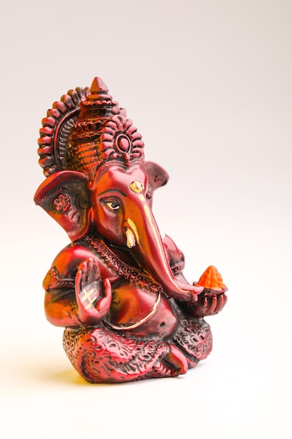 Lord ganesha sculpture on white background