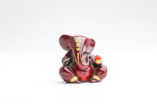 Lord ganesha sculpture on white background