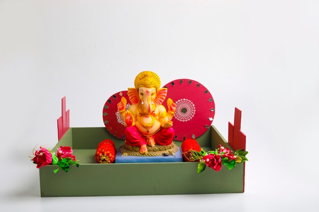 Lord ganesha sculpture on white background