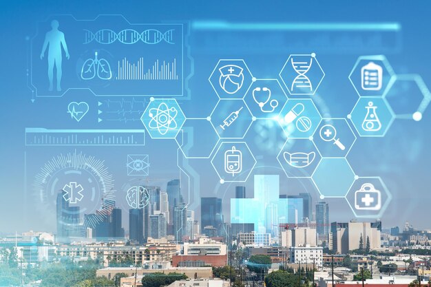 Photo los angeles panorama skyline of downtown at day time california usa skyscrapers of la city hologram healthcare digital medicine icons the concept of treatment from disease threat of pandemic