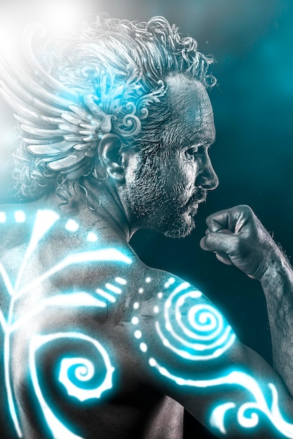 Lost gods, mythology concept, man with blue neon tribals, tattoo