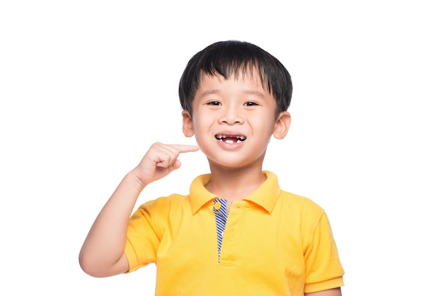 Lost milk tooth asian boy, Close up view.