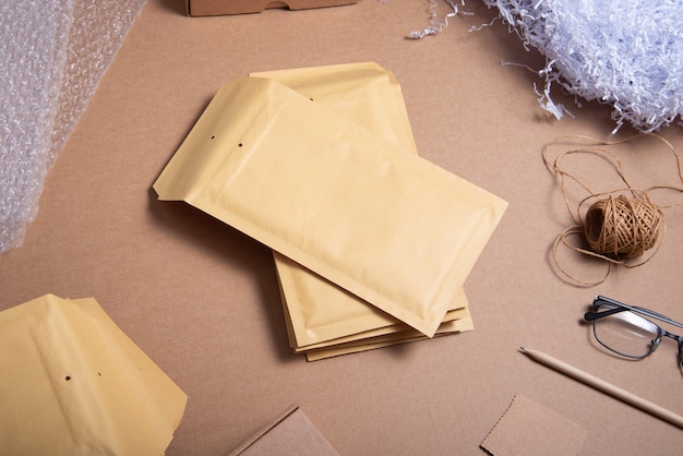 Photo lot of brown bubble envelopes on the office desk