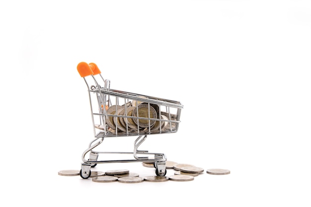 A lot of coin( Thai Baht) in shopping cart isolate on white background.