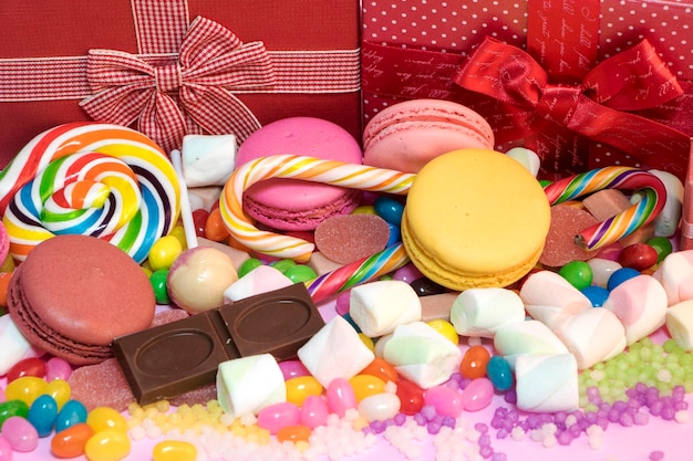 A lot of colorful candy on colourful background Valentines Day background