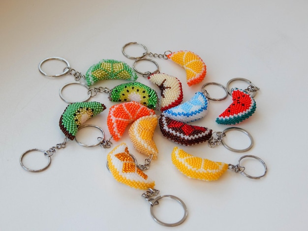 A lot of colorful key chains on a white background