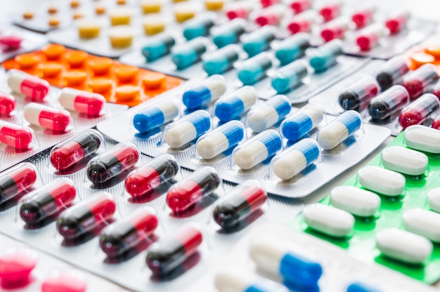 A lot of Colorful Medicine pills tablets and capsules