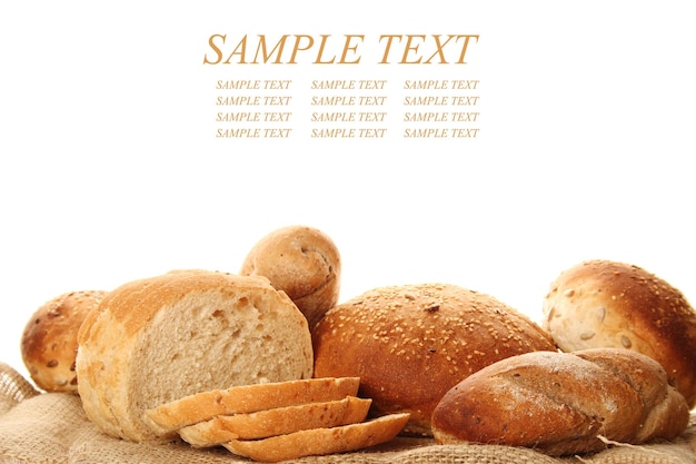 A lot of different breads are on sackcloth isolate