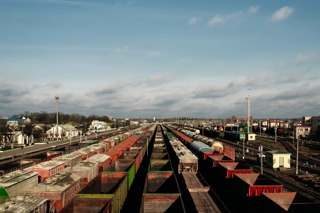 A lot of freight rail cars a cargo distribution station