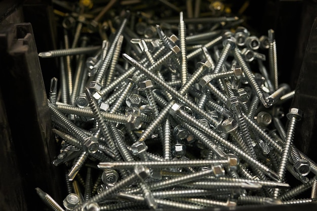 a lot of nails and screws closeup Hardware store