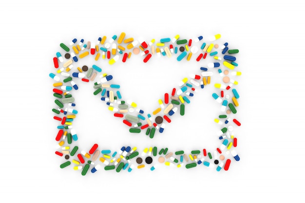 Photo a lot of pills scattered on a white background in the shape of a message envelope