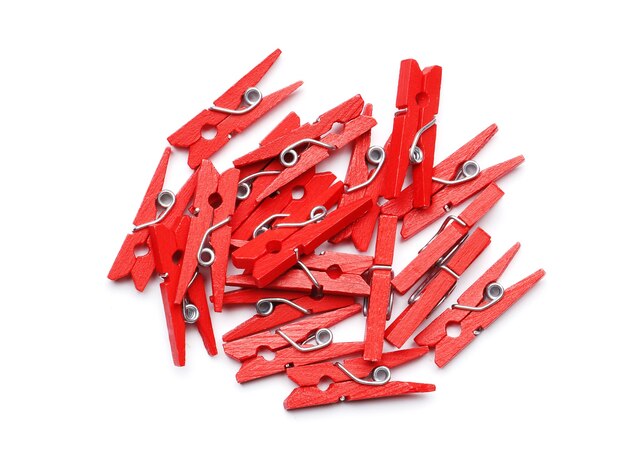 A lot of red clothespin isolated on a white background