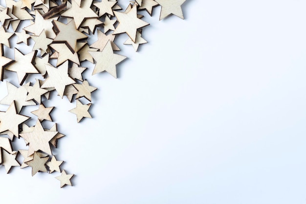 A lot of wooden stars on a white background