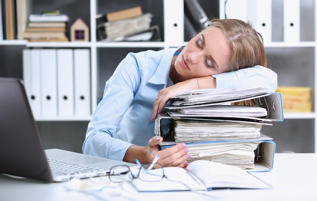 Lot of work wait for tired and exhausted woman