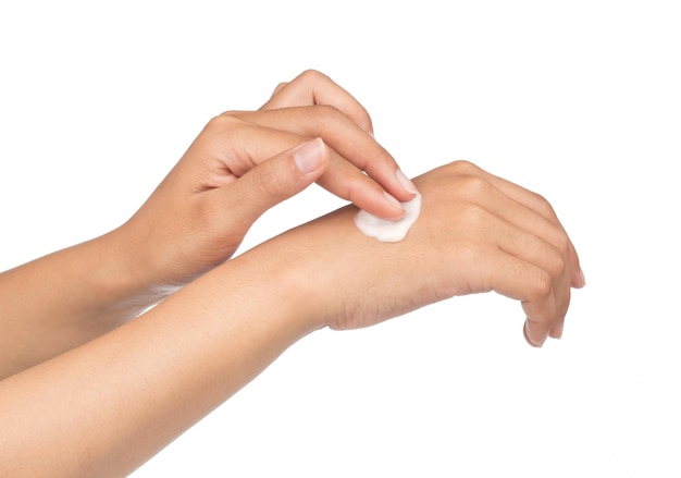 Photo lotion in hands isolated on white background