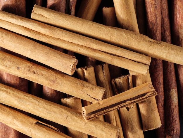Lots of cinnamon sticks. View from above.