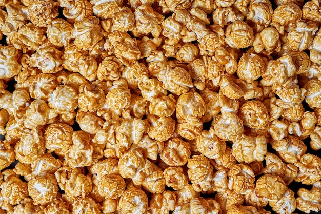 Lots of popcorn with sweet caramel close up