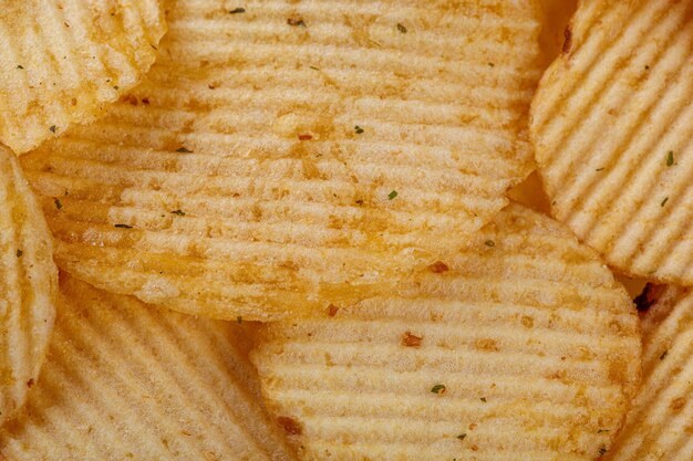 Lots of potato chips texture close up