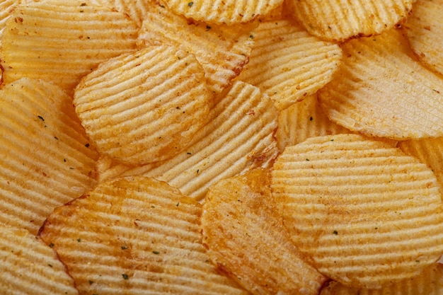 Lots of potato chips texture close up