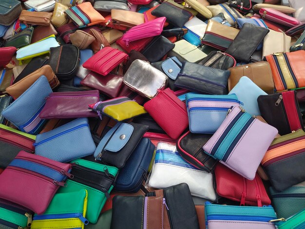 Lots of small colorful leather wallets