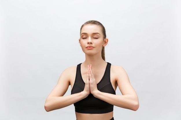 Lotus pose, yoga hands close up. Yoga woman in meditation.