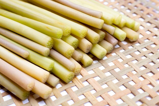 Lotus stems on bamboo weave plate